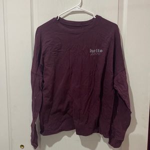 Beautiful purple sweater in size medium. cute for everyday wear